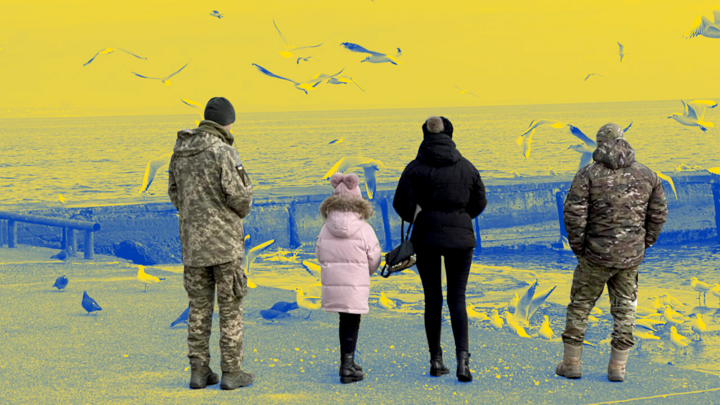 Ukrainian soldiers on leave stroll on Odesa's Langeron beach on February 3, 2023.